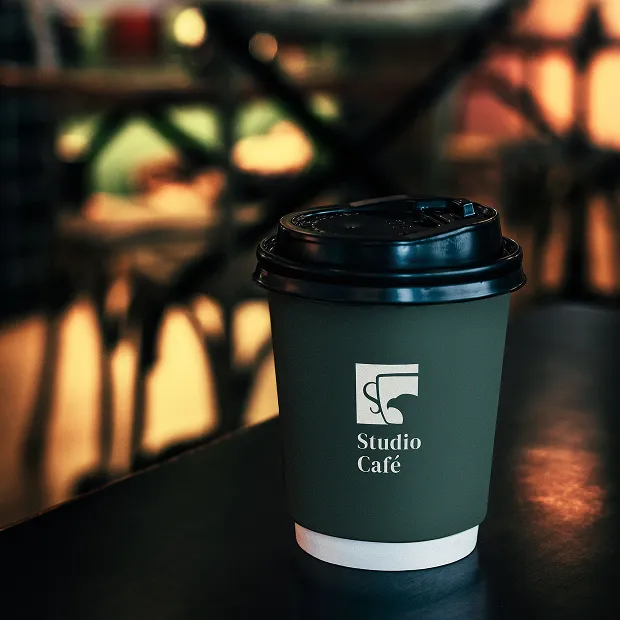 Studio Café branded iced coffee cup