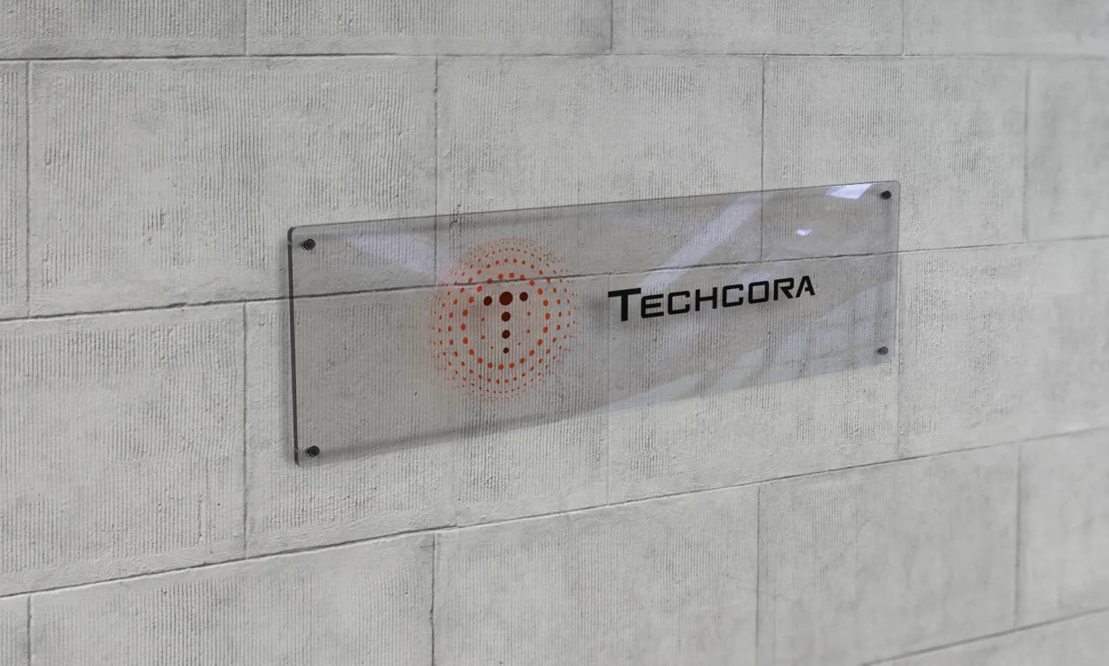 Techcora signage etched on a glass office door